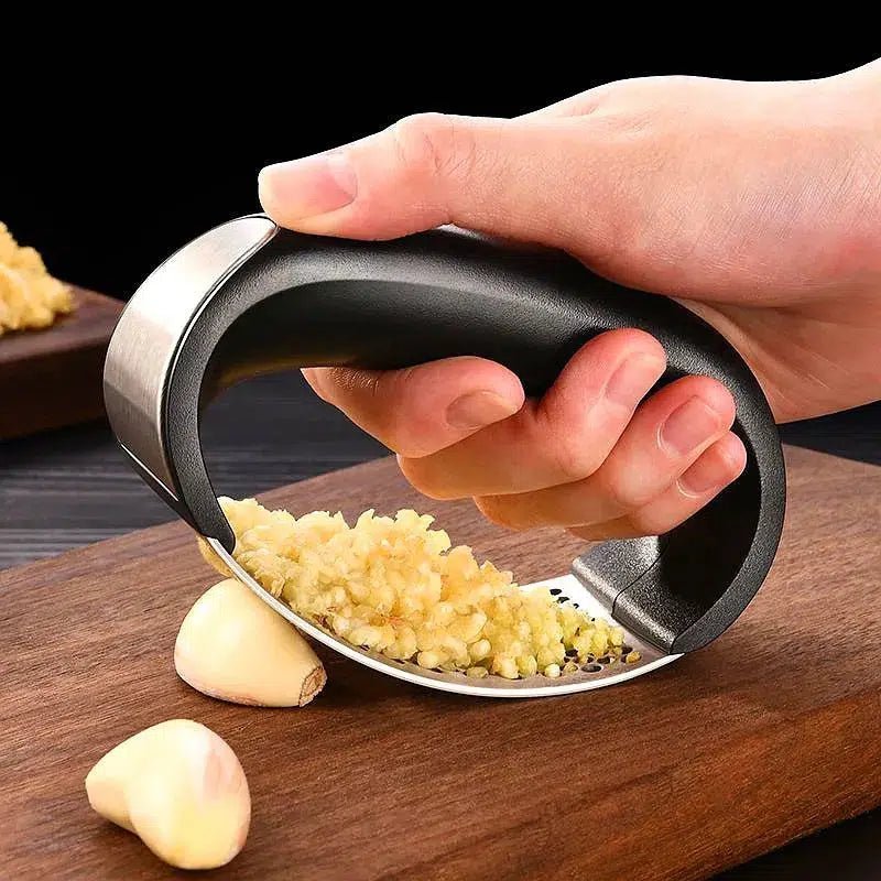 Stainless steel garlic crusher